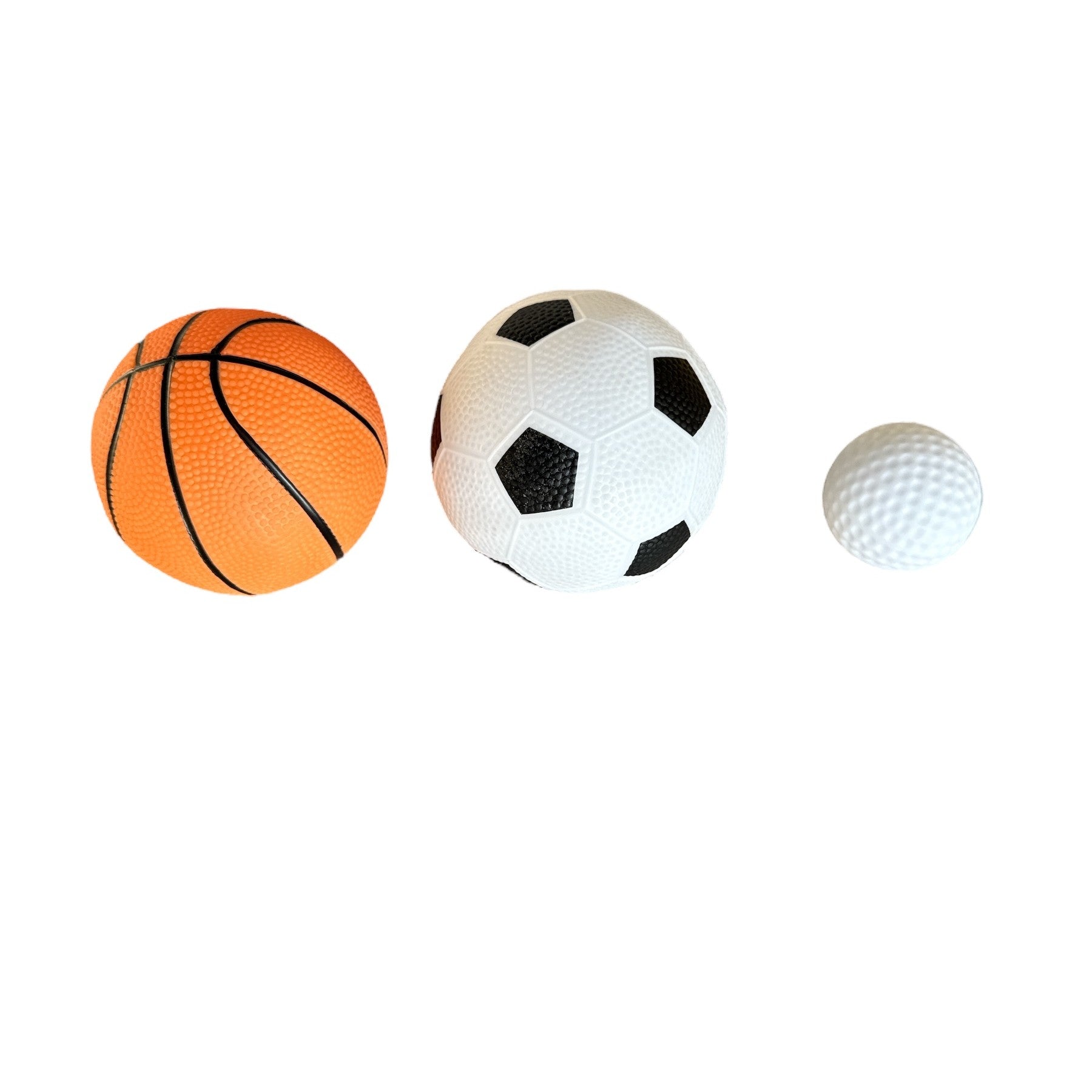 Basketball, soccer ball, and golf ball on a white background