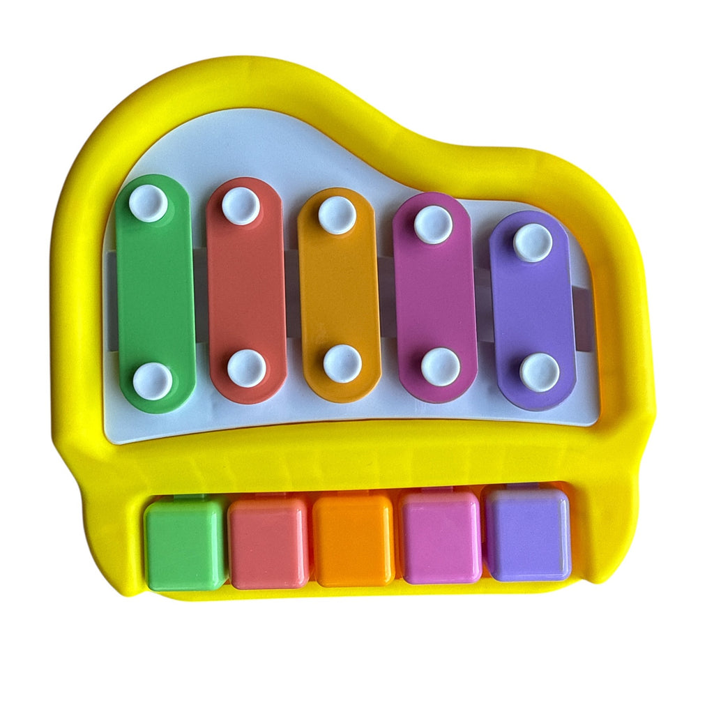 Colorful toy piano with a white background
