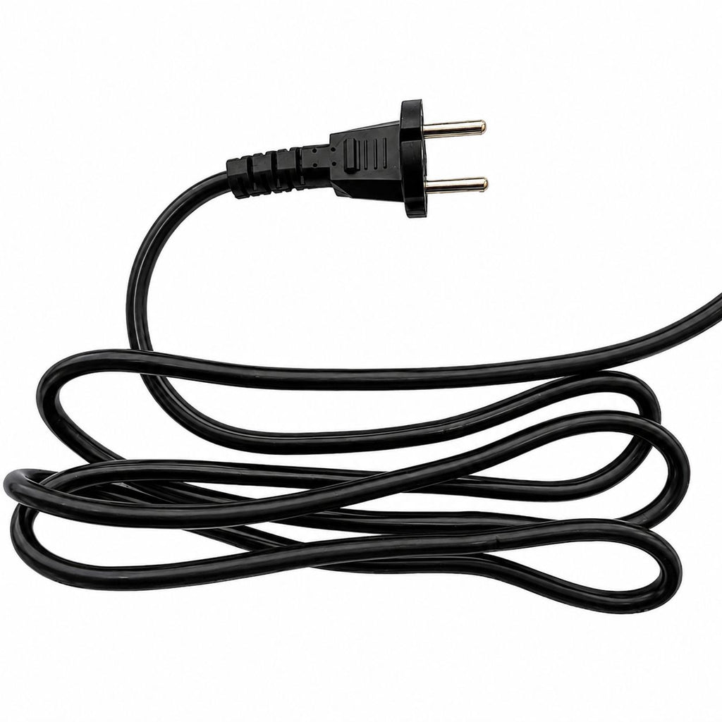 Coiled black power cord with plug on a white background
