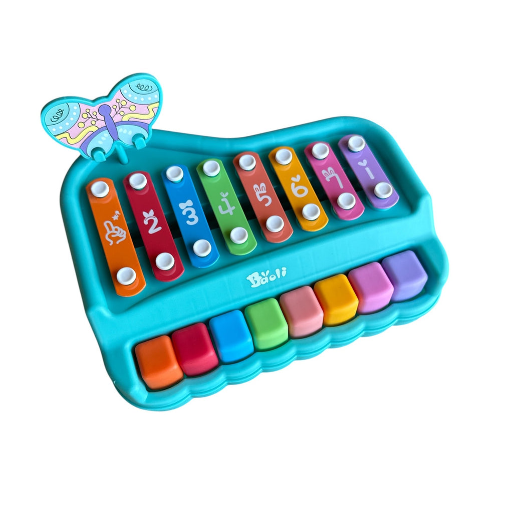 Colorful toy keyboard with letters on keys against a white background