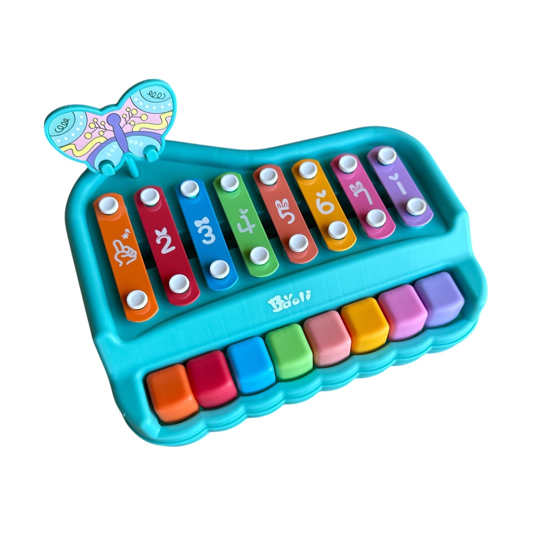 Colorful toy keyboard with letters on keys against a white background