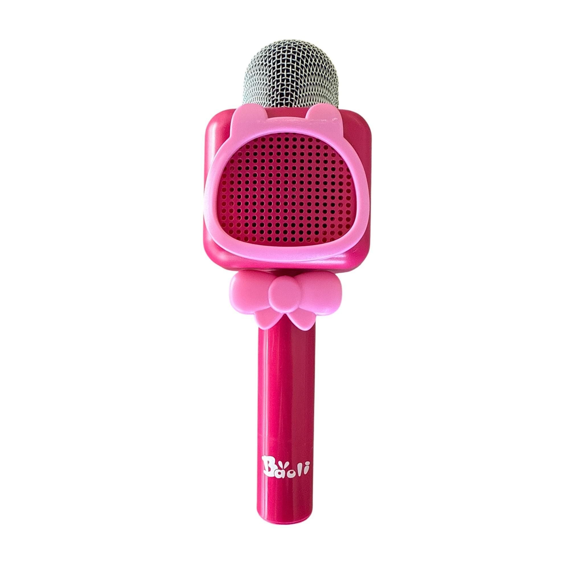 Pink microphone with a bow design on a white background