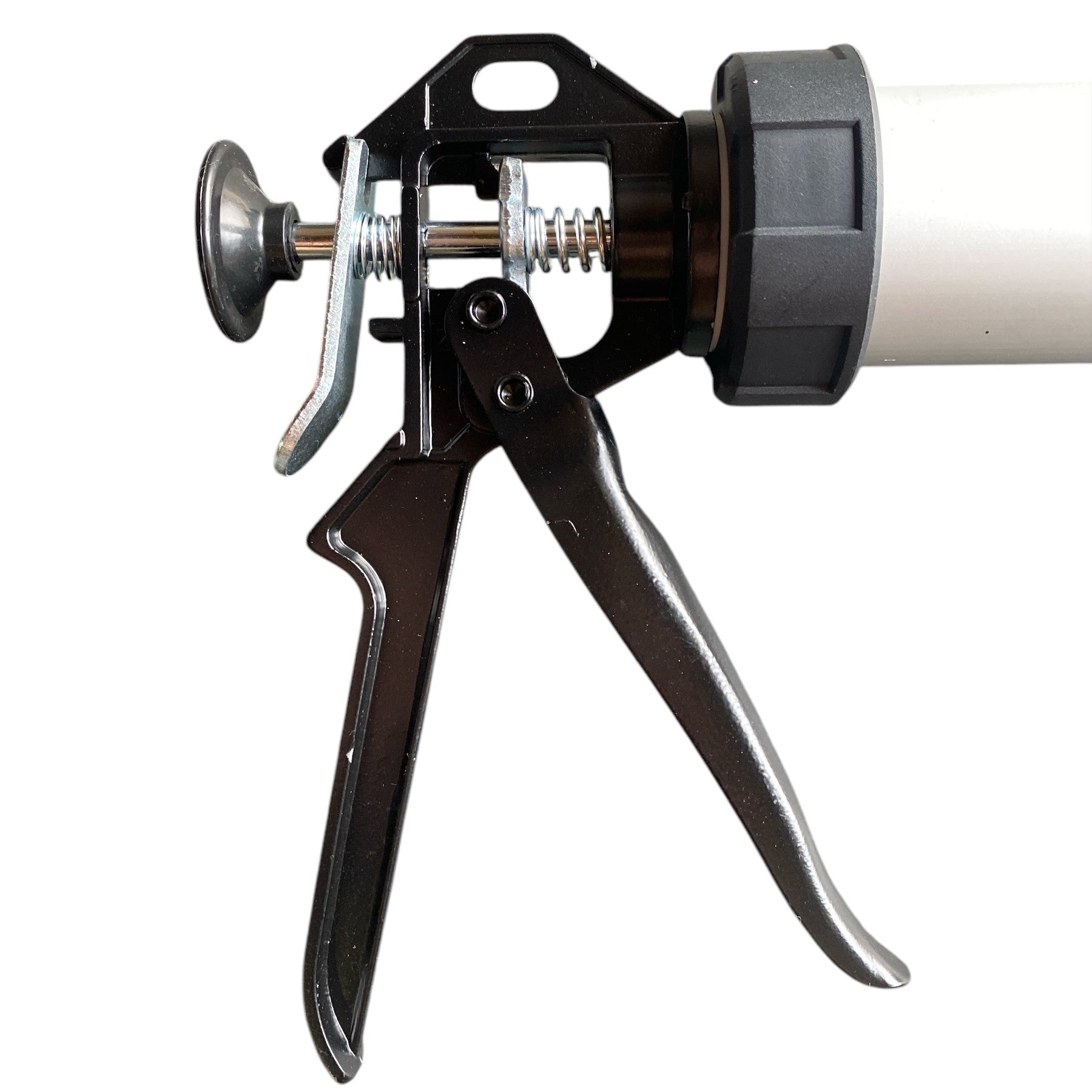 Close-up of a caulking gun on a white background