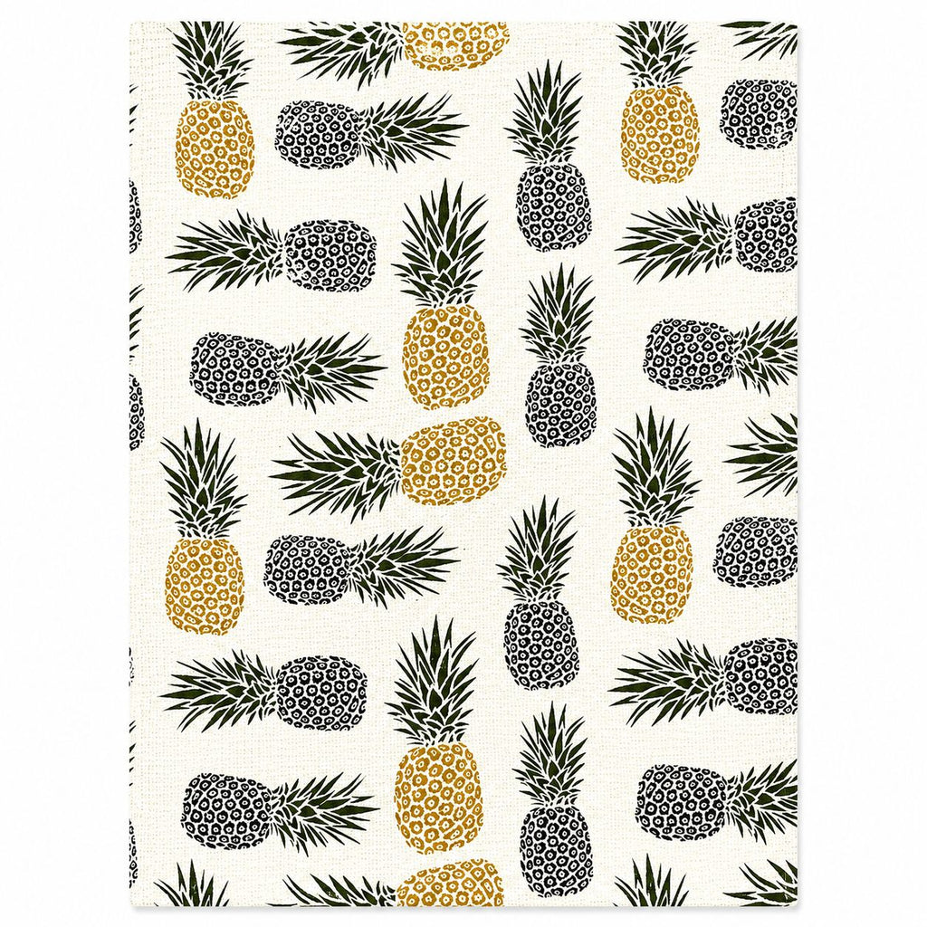 Pattern of pineapples in black, yellow, and gray on a white background