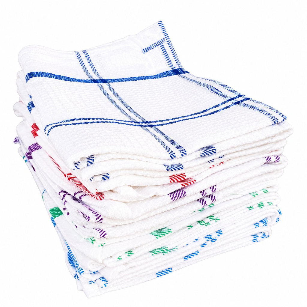 Stack of white towels with colorful patterns on a white background