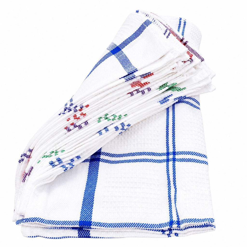 White towel with blue and red plaid patterns on a white background