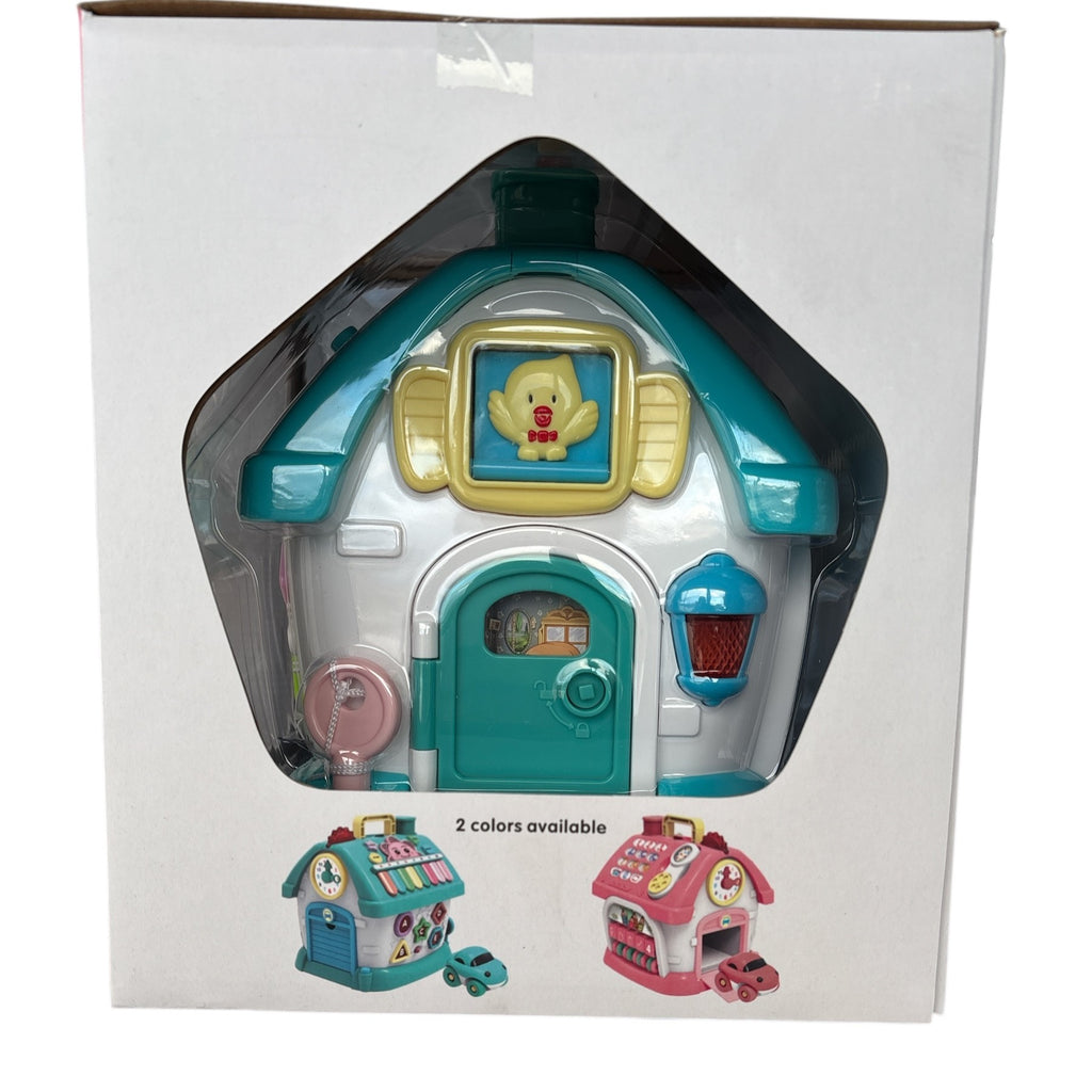 Toy house set in packaging with two smaller houses on a white background