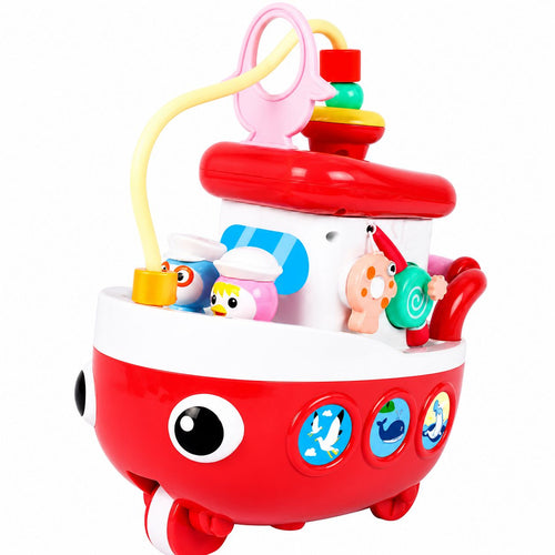 Red toy submarine with various colorful attachments on a white background
