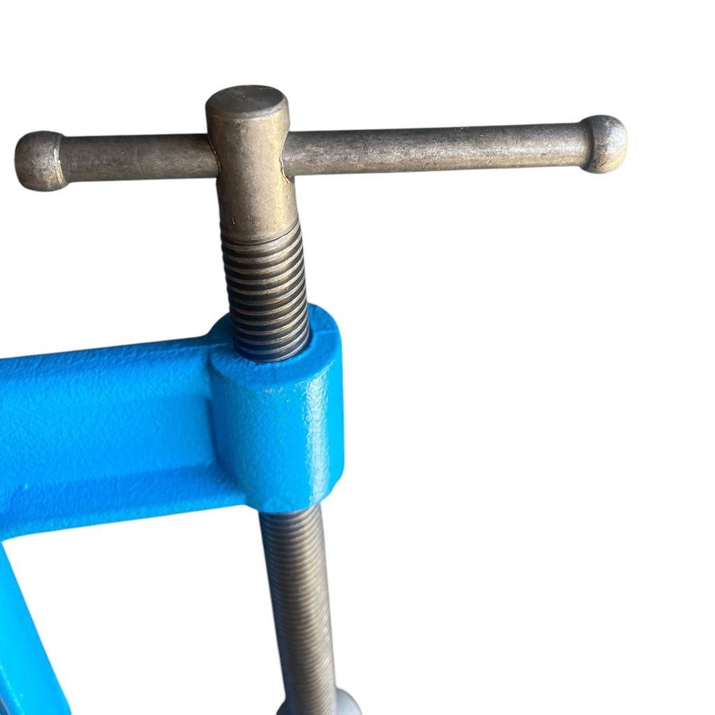 Metal tool with blue handle on a white background
