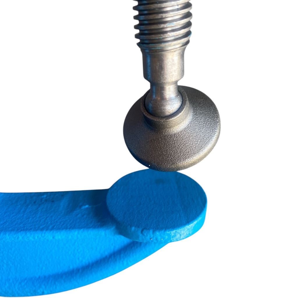 Metal screw with blue plastic washer on a white background