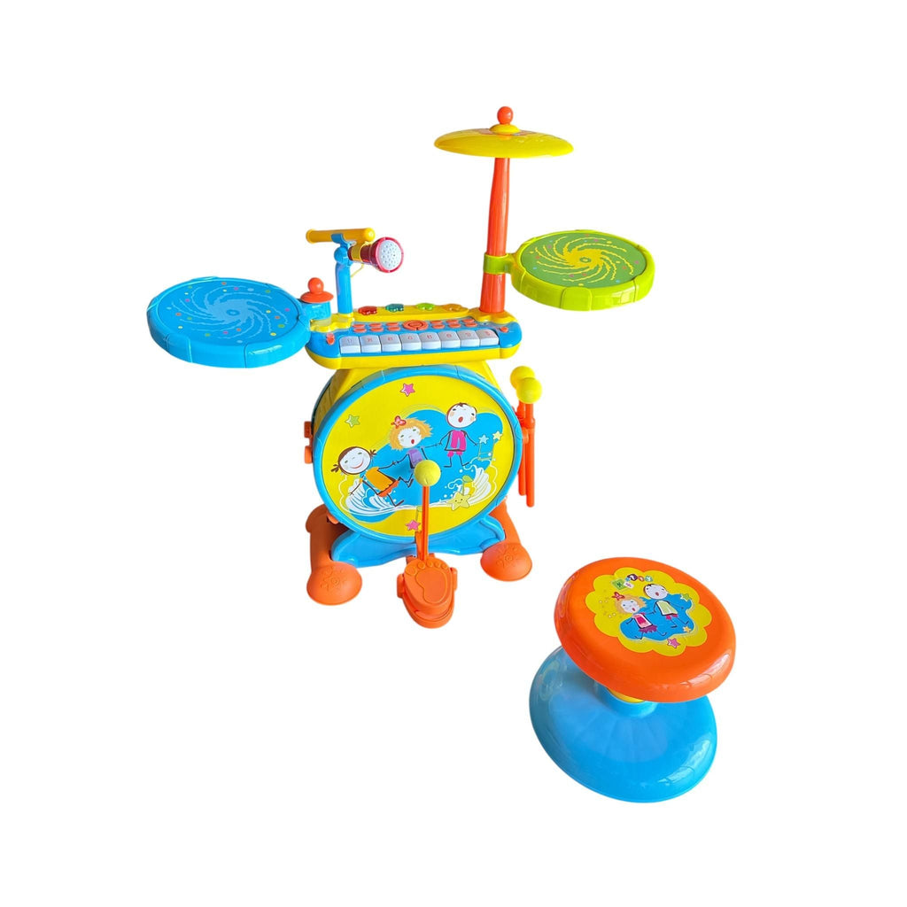 Colorful toy drum set with stool on a white background