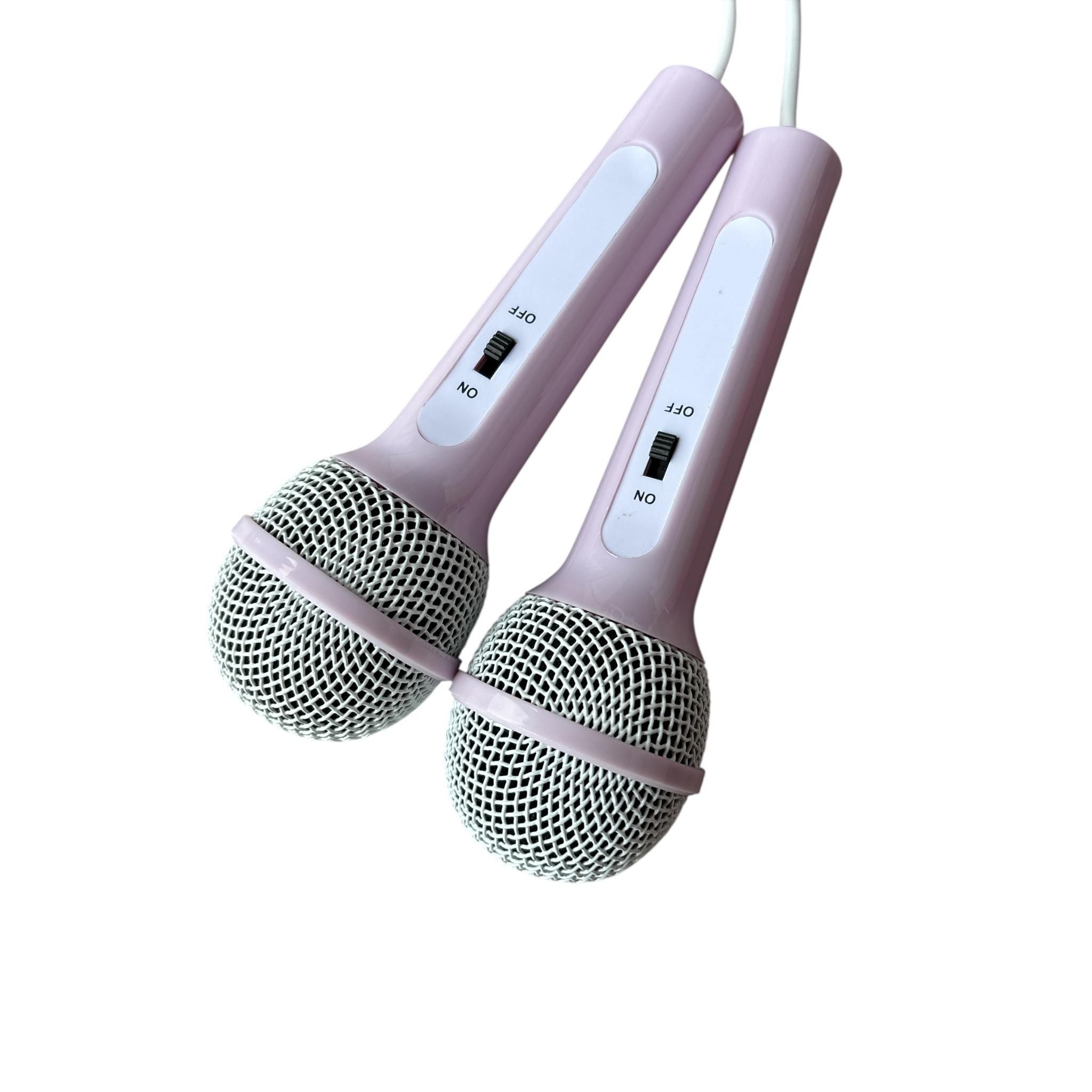 Two pink microphones on a white background