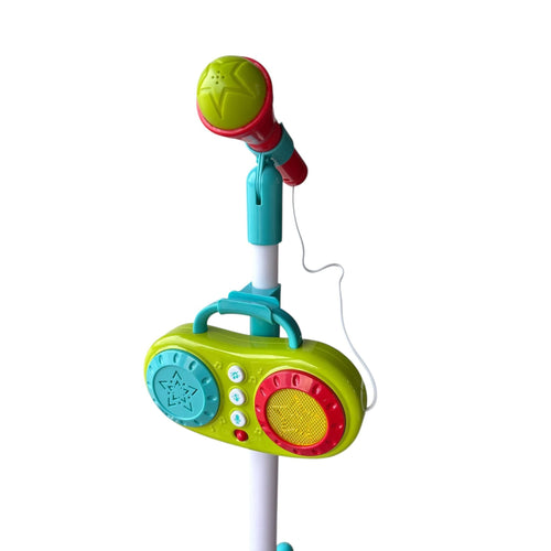Colorful toy microphone and radio set on a white background