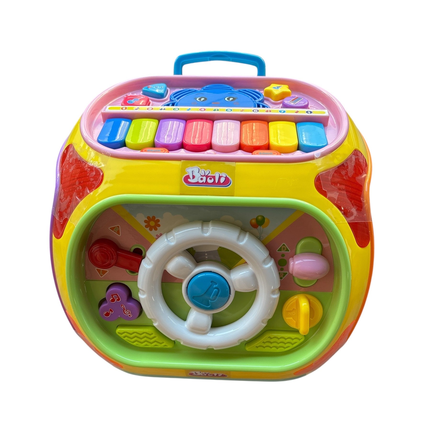 Colorful toy with piano keys and steering wheel on a white background