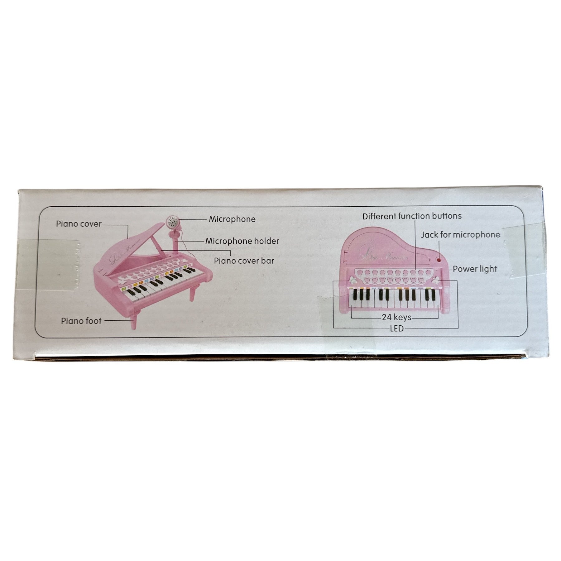 Diagram of a toy piano with labeled parts on a white background