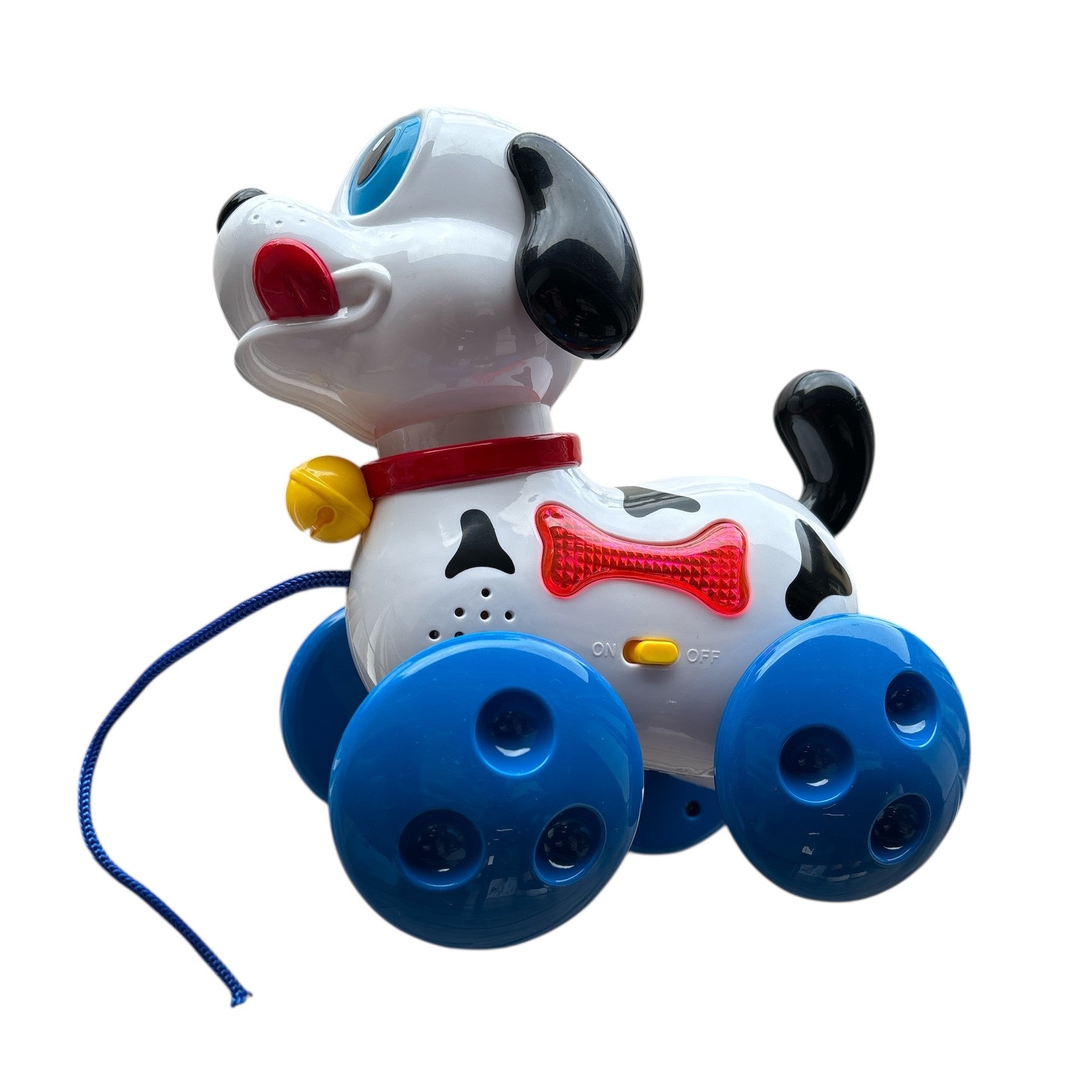 Toy dog with blue wheels on a white background