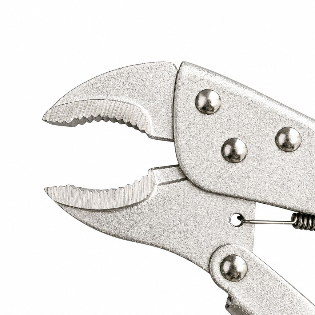 Close-up of a pair of silver pliers on a white background