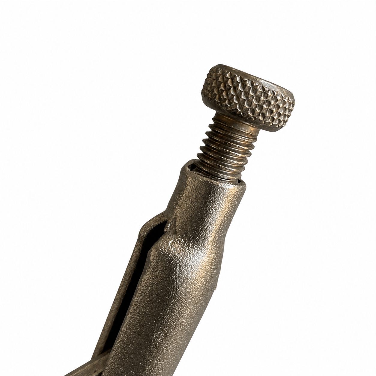 Close-up of a metal screw on a white background