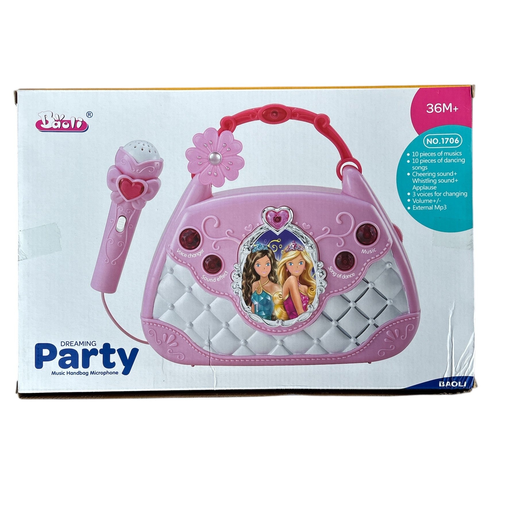 Pink toy handbag with microphone on a white background