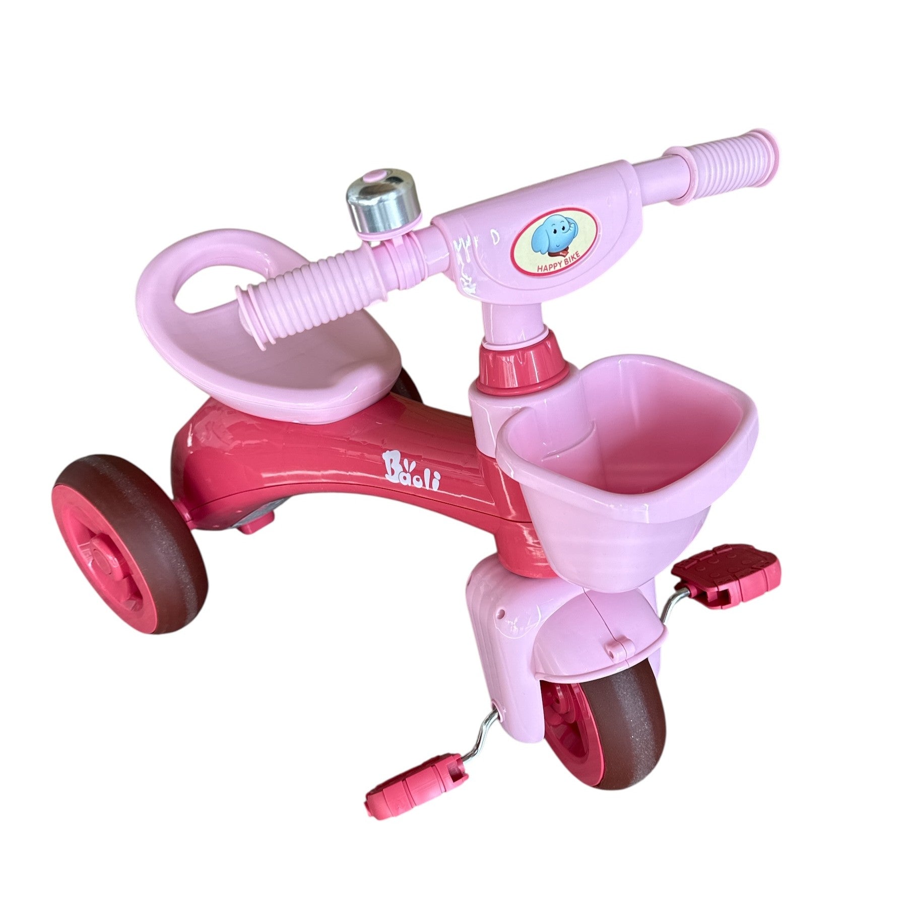 Pink and red children's tricycle on a white background