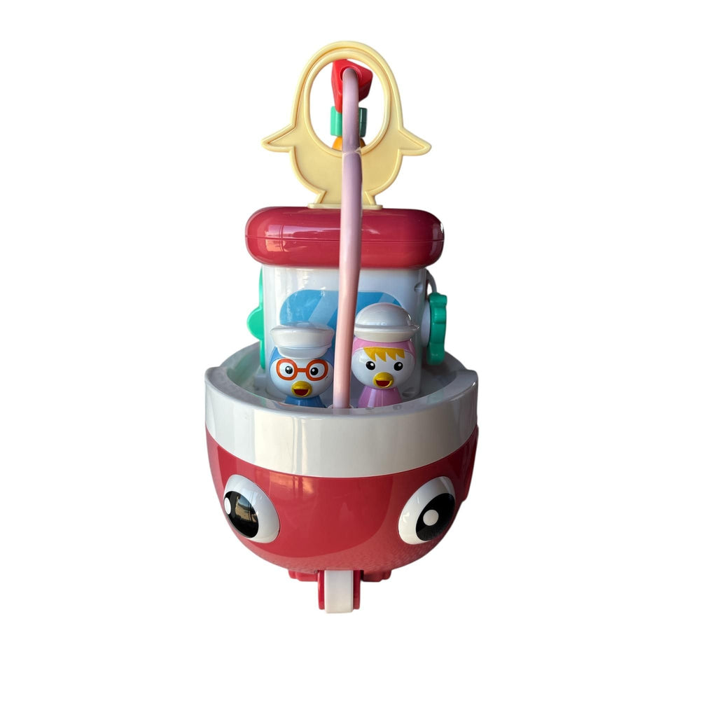 Red toy boat with cartoon characters and a straw on a white background
